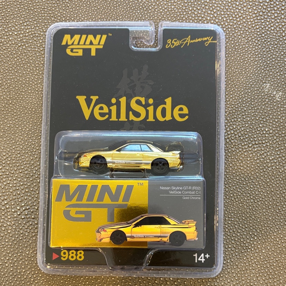 MINI GT VeilSide Gold Chrome Nissan Skyline Diecast Car